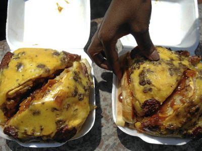 21.02.2019
Tebogo Mahlomola enjoying the bunny chow (Kota), at Daveyton.
Photo: Ziphozonke Lushaba